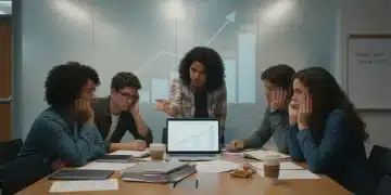 College students reviewing federal student loan documents and interest rate charts for 2026